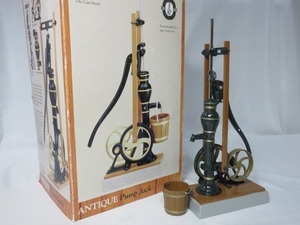 lot 21 image: ERTL Antique Pump Jack in box...
