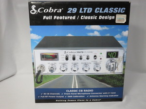 lot 23 image: Cobra class CB radio in box. Box is...