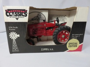 lot 27 image: Case Farmall in box  116 Scale...