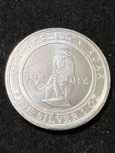 1 TROY OZ .999 FINE SILVER LION ROUND