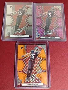 lot 19 image: (3) 2022 Mosaic Drake London Rookie Cards - (2) Mosaic Parallels