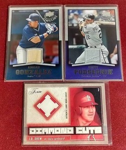 lot 47 image: (3) Game-Used JerseyBat Baseball Cards