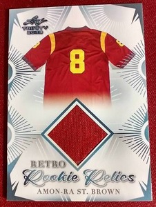 lot 103 image: 2023 Leaf Trinity Amon-Ra St. Brown Rookie Relic Card