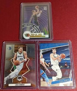 lot 148 image: (3) Luka Doncic Cards - One Prizm