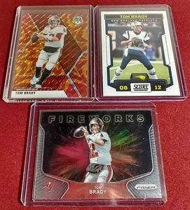 lot 246 image: (3) Tom Brady Cards - Including Orange Reactive