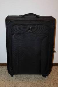lot 95 image: LuggageTravelPro Black Rolling Suitcase and L.e.i. Accessory Bag