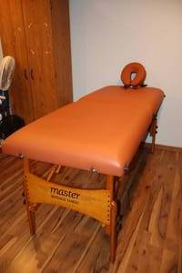 lot 2 image: Home HealthCareCostCo Collapsible Massage Table in CaseGREAT FOR THOSE IN NEED OF A MASSAGE