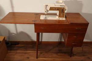 lot 6 image: Singer Sewing Machine in Fold-Down Cabinet Touch-n-Sew Model 603 wAccessories and Original Manual