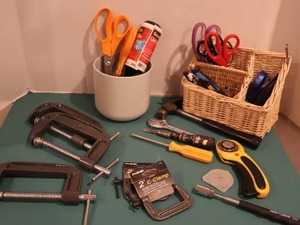 lot 22 image: KitchenShop DrawerC-Clamps, Rotary Cutter, Scissors, Hammer, Tools, wicker Pencil Caddy Etc