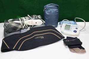 lot 39 image: Home HealthCareCopper Fit Waist Wrap, CF Stockings, Walgreens Electric Heating Pad, Life Source BO BP Monitor Etc