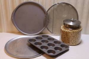lot 119 image: Kitchen EssentialsPizza Pans Perforated Mesh Wilton, Muffin Pan, Canister Jar wTin Cover