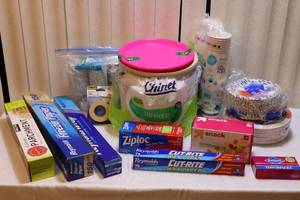 lot 129 image: Entertaining EssentialsPaper Plates Cups Freezer-Wrap(Opened), Unopened Foil, Baggies Etc