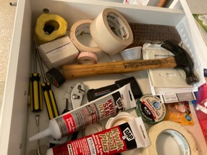 lot 142 image: Utility Drawer ContentsTape Hammer Tools Furniture Protectors Etc