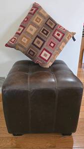 lot 26 image: Newport Leather Ottoman & Fun Throw Pillow