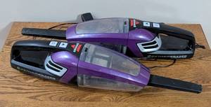 lot 109 image: Pair of Bissell Pet Hair Eraser Dustbusters