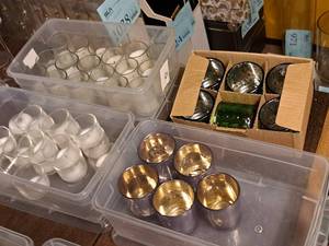 lot 1049 image: Lot of (45) Votive Candles and Candleholders (Green, Clear, Purple)