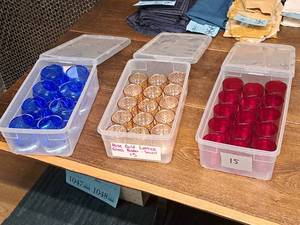 lot 1051 image: Lot of (38) Glass Votive Candleholders (Red, Gold)