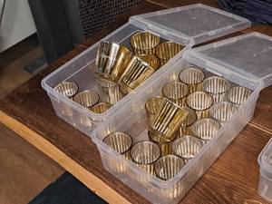 lot 1055 image: Lot of (26) Glass Votive Candleholders (Gold)