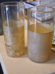 lot 1063 image: Glass Table Vases - (1) 5x12-34, (1) 6x11-34