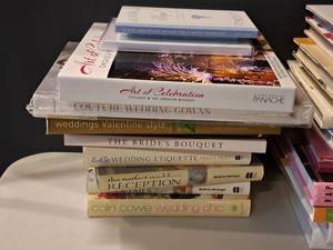lot 1123 image: Lot of (12) Assorted Wedding Books - Weddings Valentine Style, Wedding Chic, Art of Celebration, The Brides Bouquet, Couture Wedding Gowns, Wedding Etiquette and more