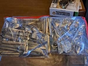 lot 1138 image: Lot of (2 Bags) Assorted Utensils - Knifes, Forks and Spoons