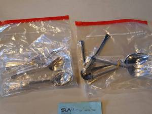 lot 1144 image: Lot of (2 Bags) Assorted Utensils - Forks, Servings Spoons