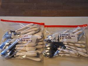lot 1151 image: Lot of (2 Bags) Assorted Utensils - Knifes, Forks, Spoons, Soup Spoons