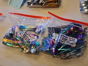 lot 1150 image: Lot of (2 Bags) Assorted Utensils - Knifes, Forks, Spoons, Salad Forks, Soup Spoons, Teaspoons