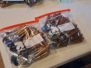 lot 1148 image: Lot of (2 Bags) Assorted Utensils - Knifes, Forks, Spoons