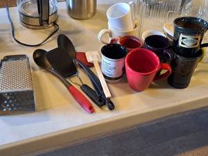 lot 1160 image: Assorted Kitchenwares - Coffee Mugs, Cooking Utensils, WaterJuice Carafe, Cheese Grater