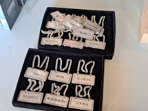 lot 1534 image: Lot of (20) Metal Decanter Bottle Tags - Scotch, Gin, Brandy, Rum, Vodka, Bourbon