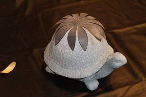 lot 31 image: Decorative Stone Turtle with Floral Shell Design