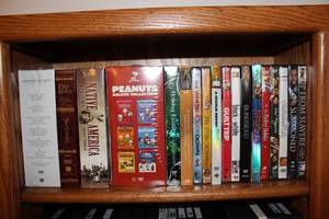 lot 111 image: Collection of 20 DVDs Including Lord of the Rings, Peanuts Deluxe Collection, and More