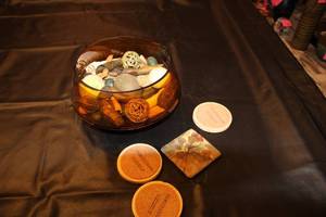 lot 113 image: Decorative Bowl with Dried Potpourri and Thirstystone Coasters Set