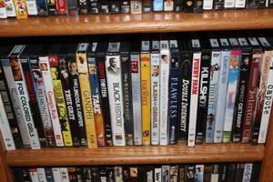 lot 123 image: Collection of 30 Assorted DVDs Featuring Various Movies