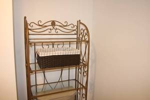 lot 153 image: Ornate Metal Bathroom Over-the-Toilet Shelving Unit with Glass Shelves
