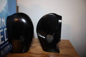 lot 177 image: Pair of Black Stone Bookends with Circular Cutouts