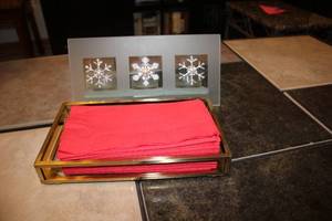 lot 204 image: Gold Napkin Holder and Snowflake Votive Candle Holder Set