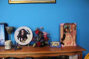 lot 246 image: Mixed Collection Inauguration Plate, Rapunzel Barbie, Miniature Car, and Floral Arrangement