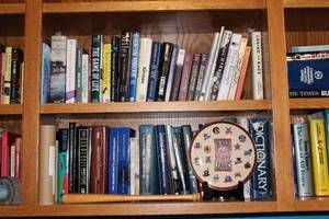lot 250 image: Negro League Baseball Memorabilia Collection with Books and Decor