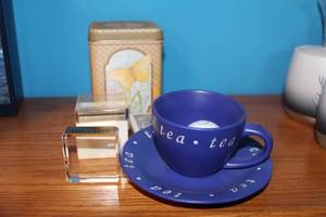 lot 257 image: Vintage Tea Set with Decorative Tins and Playing Cards