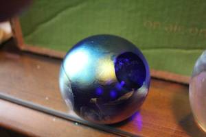 lot 262 image: Glass Eye Studio Blue Celestial Paperweight
