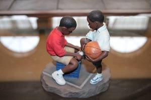 lot 282 image: Our Song Shoelaces Figurine by Brenda Joysmith