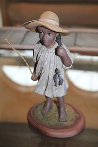 lot 287 image: Collectible Figurine of Girl with Fishing Rod and Fish