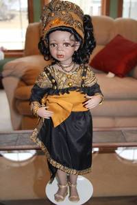 lot 291 image: Handcrafted Elegant Black and Gold Porcelain Doll with Stand