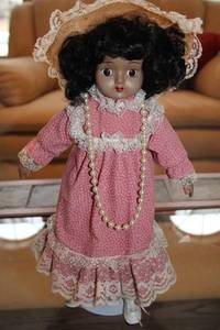lot 298 image: Vintage Porcelain Doll with Lace Pink Dress and Pearl Necklace