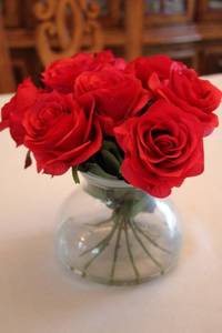 lot 320 image: Artificial Red Roses in Clear Glass Vase