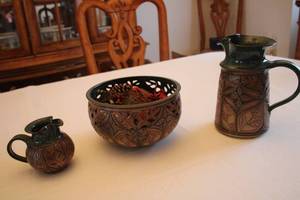 lot 326 image: Handcrafted Pottery Set with Leaf Motif Pitcher, Bowl, and Small Jug
