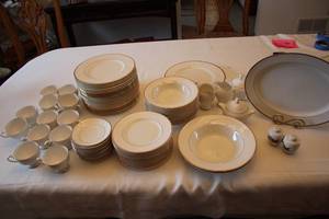 lot 339 image: Elegant 72-Piece Fine China Dinnerware Set with Gold Trim
