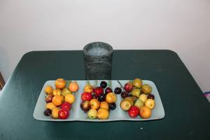 lot 405 image: Decorative Studio Nova Marble Vase with Assorted Faux Fruit Display